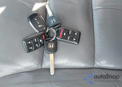 2010 Honda Odyssey Touring из США, поврежденный, VIN 5FNRL3H90AB043582